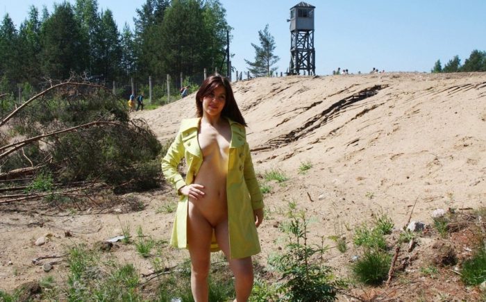 Russian girl Vika posing naked near military place