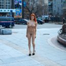 Amazing busty redhead babe walks only in shoes