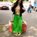 Brunette Vera M lifts her skirt at public streets