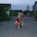 Crazy brunette masturbates with bycicle and beer bottle at garages