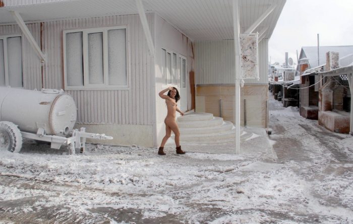 Girl with a hairy pussy walks through very cold streets