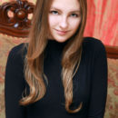 Izabel A poses so naturally on the elegant sofa showcasing her innocent and cute face, and youthful, delectable body.