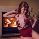 Jia Lissa spends an intimate time showing off her naked body by the fireplace