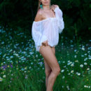 Maddison debuts in Metart, showing off her spectacular physique amidst the lush vegetation