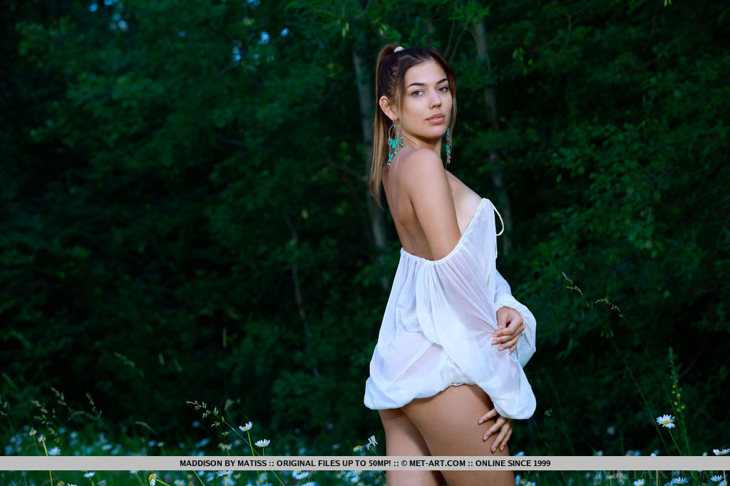 Maddison debuts in Metart, showing off her spectacular physique amidst the lush vegetation