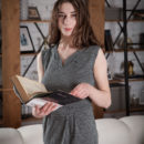 Newcomer Clary displays her luscious and meaty pussy on the couch.