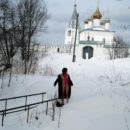 Russian babe plays with snow on small bridge