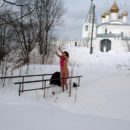 Russian babe plays with snow on small bridge