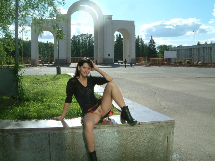 Russian brunette with no panties flashes at public park