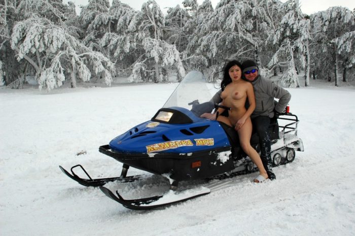 Nude russian girl wants to ride a snowmobile