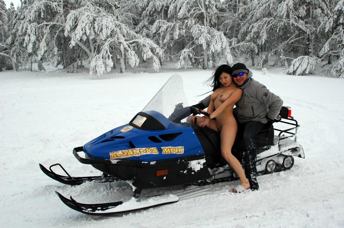 Round Ass Babes On Top Of Polaris Snowmobile Wallpapers
