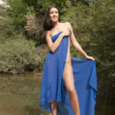 With just a sheer royal blue shawl to cover her fine luscious body, Mariy makes an enchanting presence by the river, posing naked without any hint of inhibition.