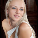 Alysha A s youthful beauty, nubile and slender figure, beautiful puffy breasts and long, svelte limbs complimented by her long sexy gown and strappy sandals.