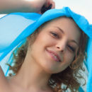 Nikia A suns her naked body on the water