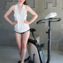 Tanya Grace flaunts her creamy body and ripe cherry as she strips on the gym.