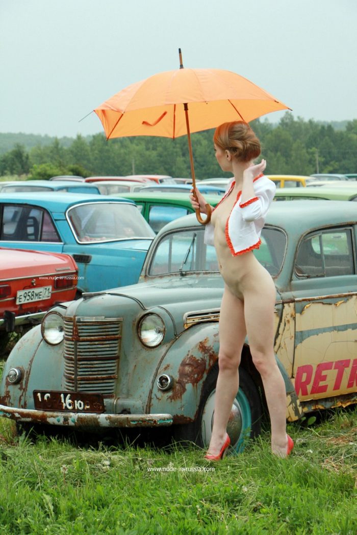 Russian babe Eva Gold at retro cars museum