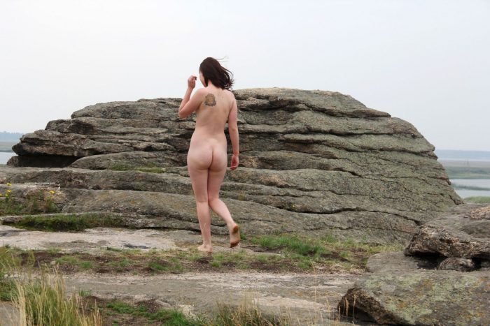 Russian girl Inga walks naked at touristic place