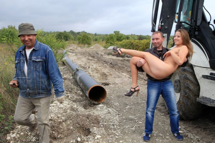 Russian teen Taissia A posing naked with workers