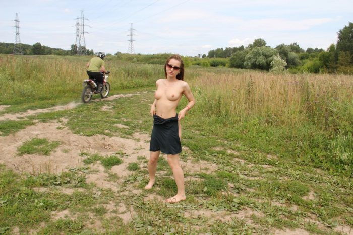 Sweet russian girl Abbey walks naked outdoors