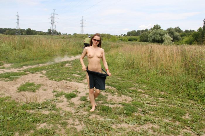 Sweet russian girl Abbey walks naked outdoors