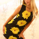 Luba B is sweet in her sunflower dress and shows off her hairy pussy.