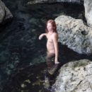 Naked Margarita S posing at tourist place