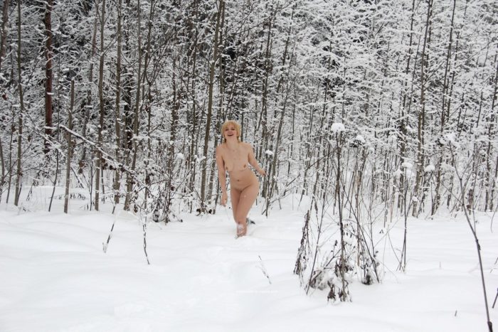 Naked blonde Elena B at snowy road