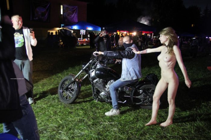 Naked girl Eva Gold rides a motorcycle