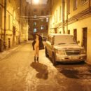 Naked girl Zhenja plays with a snow at night