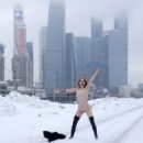 Nude Eva Gold shows her ass near Moscow City