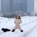 Nude Eva Gold shows her ass near Moscow City