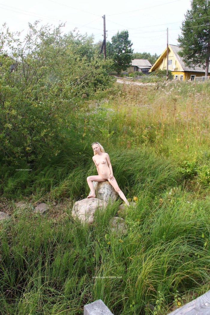 Russian blonde Maria walks naked at village