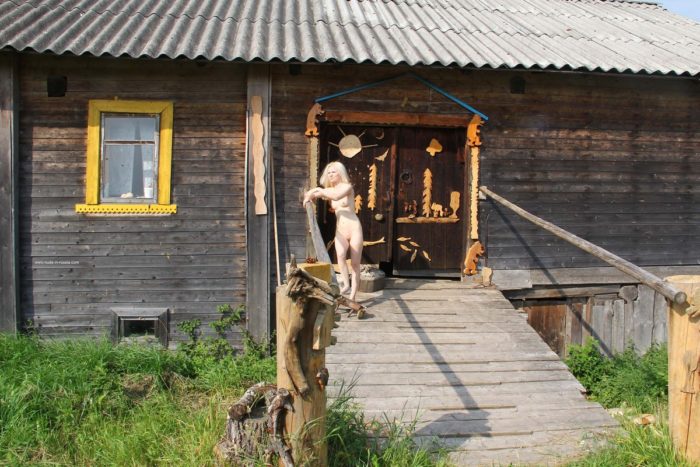 Russian blonde Maria walks naked at village