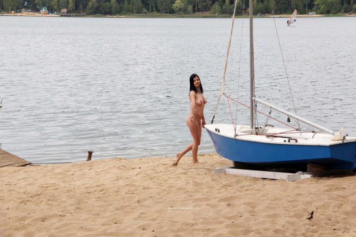 Russian girl Kat goes naked at public pier