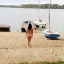 Russian girl Kat goes naked at public pier