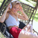 Top model Danica Jewels bares her gorgeous tits as she strips outdoors.