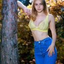 Top model Dakota Pink flaunts her gorgeous tits and meaty ass as she poses outdoors.