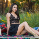 Sultry Cira Nerri flaunts her gorgeous body as she strips on the grass.