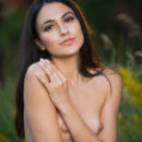 Sultry Cira Nerri flaunts her gorgeous body as she strips on the grass.