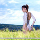 Gabriele shows off her sexy, slender body as she sensually poses on the rice field.