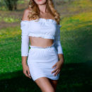 Gabriella strips on the grassy field as she displays her tight body and yummy pussy.