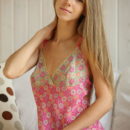 Katherine A in a sweet pink dress that exudes her youthful beauty