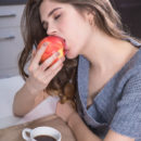 Luna Pica strips in the kitchen, baring her sexy, slender body as she eats her apple.