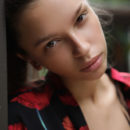 Elin takes off her robe, bra and panties and ponytail, She poses her beautiful by a tree.