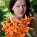 Gia B beautiful as a flower opening her legs to expose her neatly trimmed hairy pussy