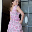 Trista A shows off her naked body under her pretty dress.