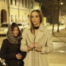 Beautiful blonde Mary walks only in black boots