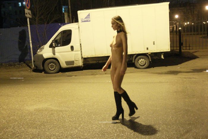 Beautiful blonde Mary walks only in black boots