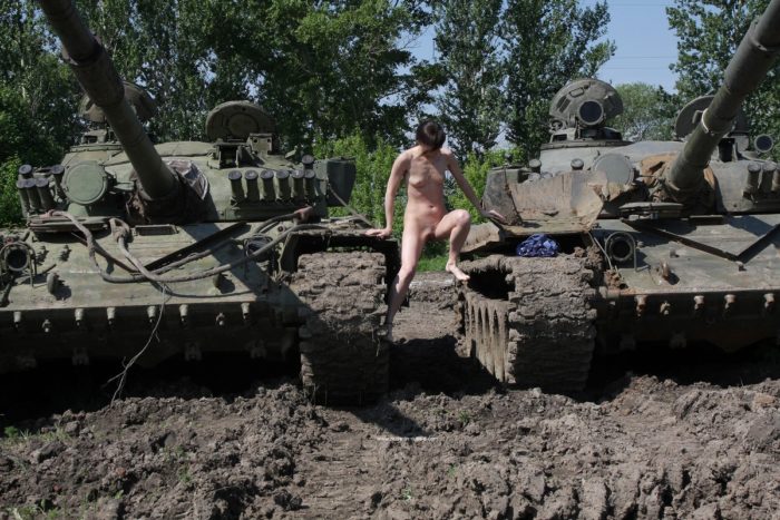 Naked Diana A posing on tanks