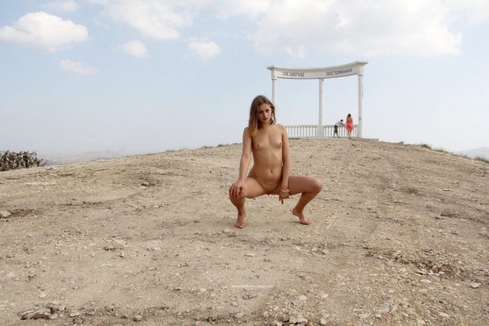 Naked Olga W shows herself at viewpoint